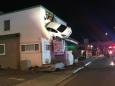 Speeding car flies into the air and crashes into top floor of California building