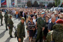 Tearful mourners line up to bid farewell to east Ukraine rebel chief