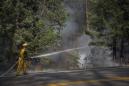 Firefighters gain on sprawling California wildfire, six dead