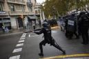 Spanish police fire rubber bullets near voters in Catalonia
