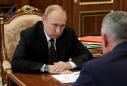 Putin, after three days, says fire-hit Russian submarine was nuclear-powered