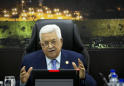 Palestinian leader fires advisers, wants bonuses returned