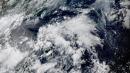 Developing tropical system looms for flood-weary South Korea, Japan