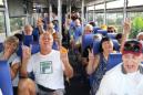 Cruise passengers scatter, take Cambodia bus tours despite virus fears