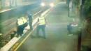 Shirtless Woman in the Path of Oncoming Train Rescued by Police in Pulse-Pounding Video