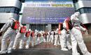 China sees 'coming victory' over coronavirus as global alarm spreads