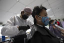 Hairstylist gives free haircuts to Thai health frontliners