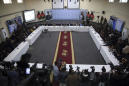 Afghan president wins vote, opponent says he's the winner