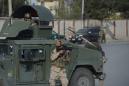 Dozens of Afghan security forces killed in Taliban raids: officials