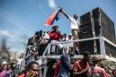 Thousands protest against Haiti's president