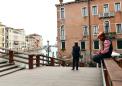 Quarter of Italians on lockdown as virus sweeps globe