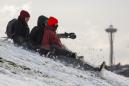 Skis, sleds, laundry baskets ... kayaks? Seattle residents take advantage of record snow