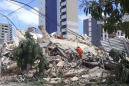 7-story building collapses in Brazil; 1 dead, others trapped