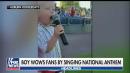 Boy wows baseball fans by singing the national anthem