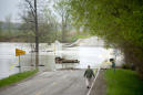 Thousands evacuated as river dams break in central Michigan