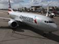 A Black social worker is suing American Airlines, alleging employees accused her of kidnapping the white toddler she was escorting on a flight