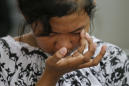Indonesian officials fear 5,000 missing as Christians pray