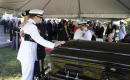 The Latest: Horse-drawn caisson carries McCain's casket