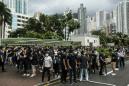 Hong Kong financial workers stage flash protest