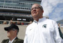 The Latest: Nike says it's following events at Michigan St.