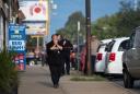 One suspect nabbed, one sought in shooting rampage that killed 4, wounded 5 in Kansas bar