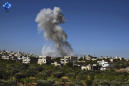 Syria activists: Strikes kill 4, including woman, her child