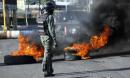 Venezuela seeks extradition of suspect accused of burning man to death