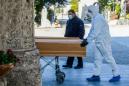 Italy passes China's virus deaths and braces for long lockdown