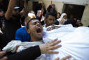 Gazans bury policemen killed in rare attacks within strip