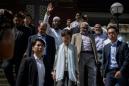 Hong Kong leader visits mosque struck by blue water-cannon dye