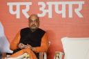 Amit Shah: Modi's enforcer emerges from behind India's throne