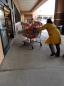 'Disgusting' photos show vendors bring shopping carts full of raw, unpackaged meat into grocery store