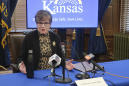 Judge doubts Kansas COVID-19 rule, blocks it for 2 churches