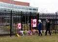 Police hunt for motive as Canada's worst mass shooting death toll rises to 23