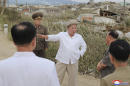 Seeking unity, NKorea's Kim vows to overcome typhoon damage