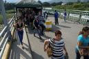 Venezuela partially opens border with Colombia that was shut in February