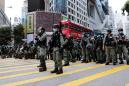 Hong Kong legislature surrounded by riot police ahead of expected protests