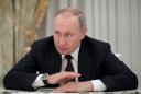 Putin lays out path to staying in power