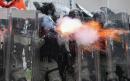 Hong Kong police fire teargas and rubber bullets as demonstrators defy ban on protest against triad thugs