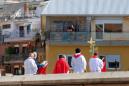 Amid coronavirus outbreak, Pope Francis celebrates Palm Sunday Mass without the public