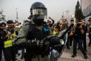 Riot police break up Hong Kong rally for China's Uighurs