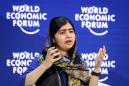 Malala lauds feminism as Trump lands in Davos
