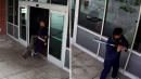 Cop Tackles Man Seen Hitting Police Station Windows With Baseball Bat