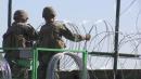 Troops fortify US-Mexico border with razor wire