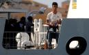 Italian ship accused of taking migrants back to Libya for first time