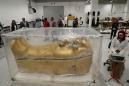 Egypt displays restoration of Tutankhamun gilded coffin
