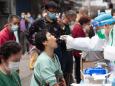 Photos show how Wuhan tested 6.5 million people for the coronavirus in 9 days, while the US has only tested 14 million people in 4 months