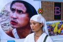 Tears at Bangkok memorial for murdered activist