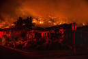 'Utter devastation': Three dead as multiple wildfires in California explode in size