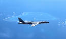 Chinese long-range bombers join drills over South China Sea